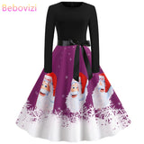 Bebovizi Winter Dresses Women 2019 Plus Size Purple Christmas Party Dress Santa Claus Print Vintage Elegant Long Sleeve Vestidos